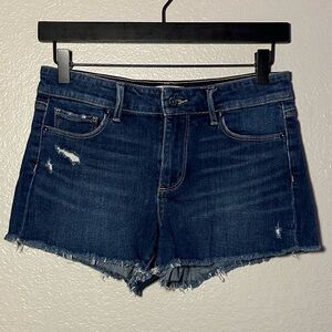 PAIGE Distressed Denim Shorts in Medium Blue Wash